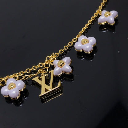 Miro LOGO 6 MOTIF STAR AND SUN GOLD BRACELET